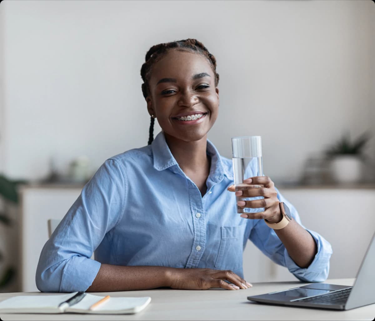 Woman drinking eight water
